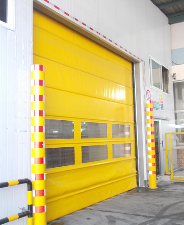 PVC que apila la puerta de plegamiento industrial de la persiana rápidamente enrrollable de las puertas del garaje