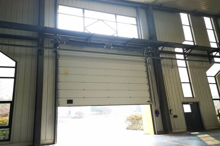 Speed 1.0m/s Exterior Security Industrial Sectional Doors Rolling Back Model