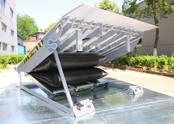 Plataforma de hormigón niveladora de muelle con motor de aire gris para elevación de objetos pesados