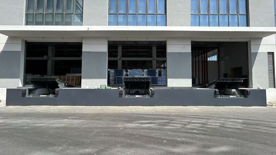 Nivelador de muelle hidráulico telescópico para almacén industrial